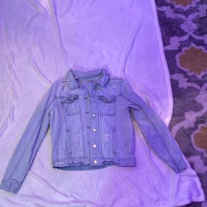 never worn light blue ripped jean jacket from